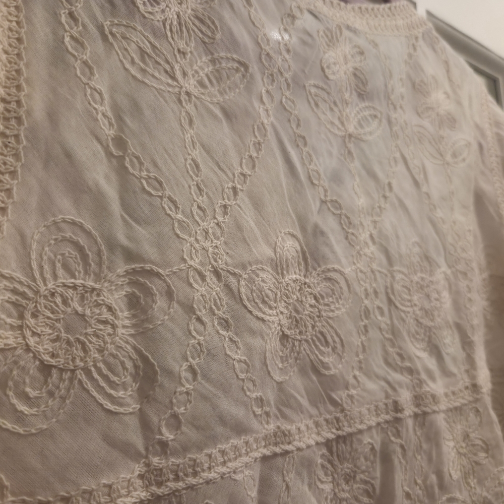 AZ Elegant Crochet Lace Blouse in Cream With Ruffled Sleeves & Fringe - Picture 9 of 10